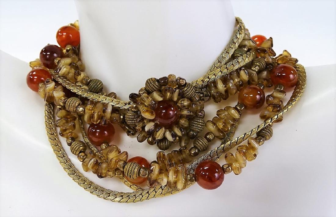 HATTIE CARNEGIE RARE LG GOLD TONE NECKLACE: 4 strand, 14 in choker w/ faux carnelian stones. Shipping to be $15 plus insurance US. We will combine shipping.