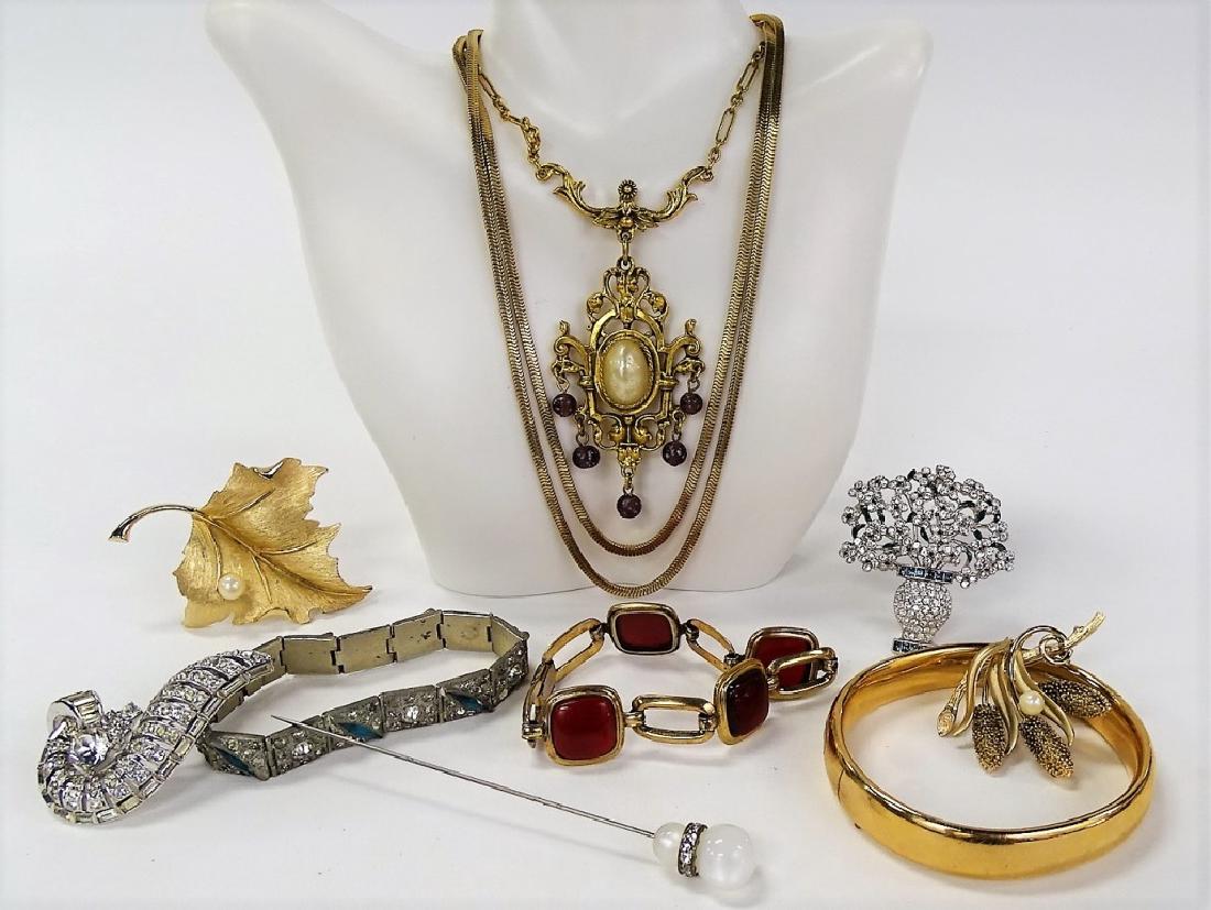 LARGE LOT OF COSTUME JEWELRY: To include a silver tone and rhinestone flower pot pin, a Mazer Bros silver tone and marcasite seahorse pin, a deco silver tone and marcasite bracelet, a faux pearl stick pin, a vintage gold filled ba
