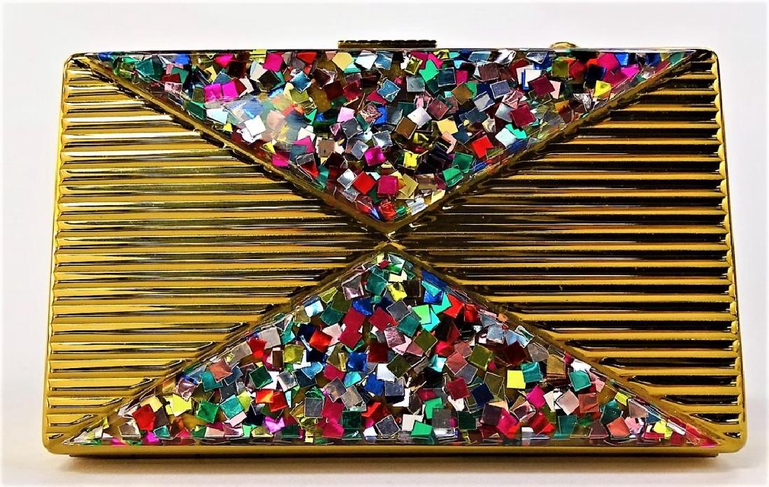 RETRO KUM KLEAN GOLDTONE CARRYALL CASE: Retro Kum Klean goldtone metal carryall or minaudiere case. In rectangular shape with snake chain strap, decorated with acrylic confetti panels. Has mirror, lipstick tube, comb, powder well, and two s