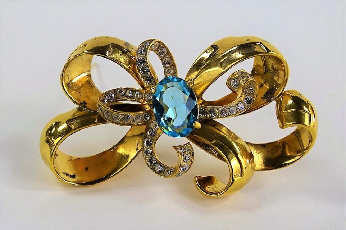 VINTAGE MAZER BROS GOLD TONE BOW PIN RHINESTONES: About 2 1/2" wide shipping to be $15 plus ins we will combine shipping