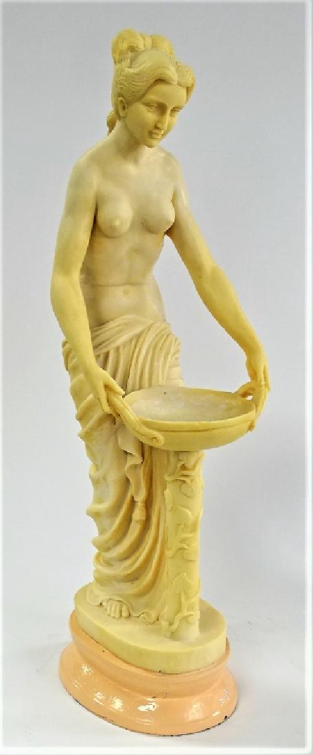 VINTAGE ITALIAN COMPOSITION OF A WOMAN BY FOUNTAIN: Vintage Italian composition of a woman by wash basin stands on top of a pink base. Measures approx 25" tall. Will not ship can refer local shippers.