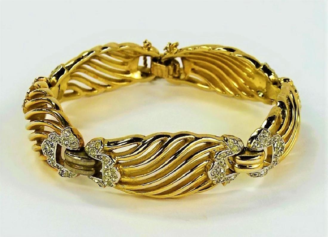 TRIFARI PHILLIPPE RHINESTONE BRACELET: Includes a signed Trifari Phillippe gold tone w/ rhinestone bracelet. Shipping to be $15 US. We will combine w/ price.