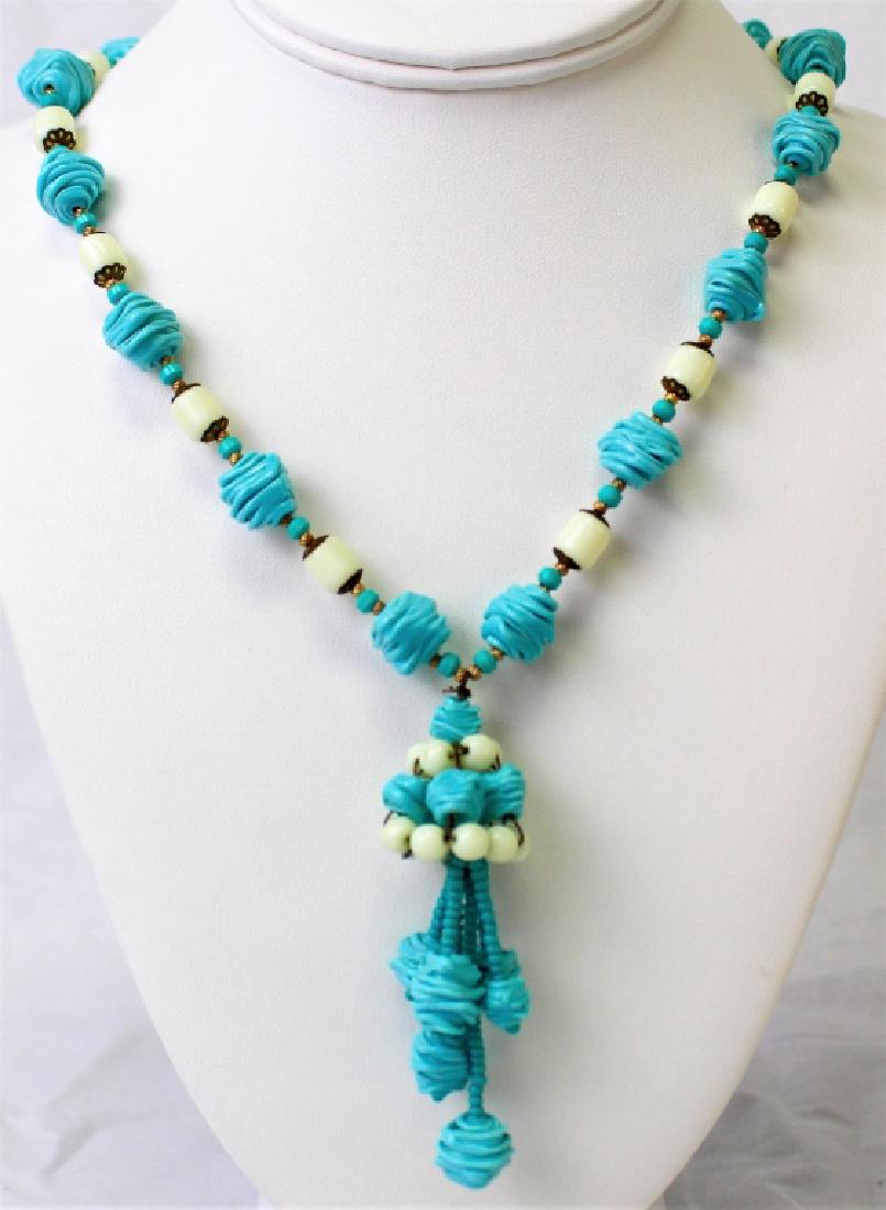 CARNEGIE TURQUOISE AND WHITE BEAD DANGLE NECKLACE: To include a signed Hattie Carnegie turquoise and white bead dangle necklace. Shipping to be $15 US. We will combine w/ price.
