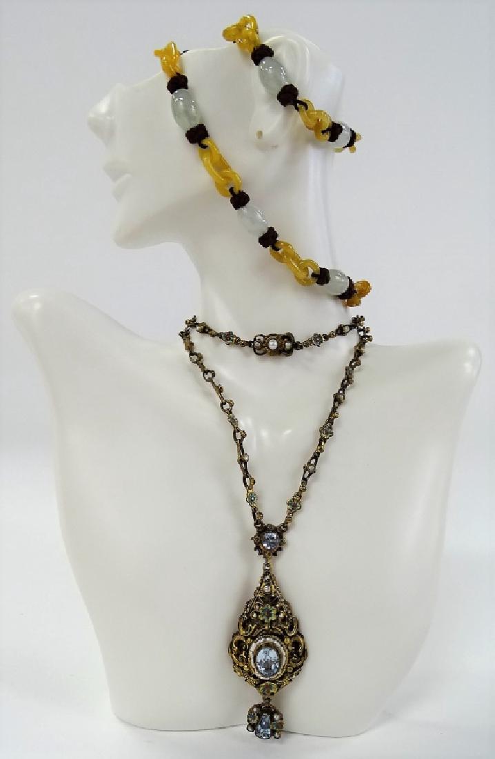 PAIR OF INCREDIBLE VINTAGE CZECH NECKLACES: To include a blue rhinestone w/ enamel and seed pearl choker necklace w/ pendant and a Czech Deco bakelite and milky colored stone choker necklace. Shipping to be $15 US. We will combine w/ price.
