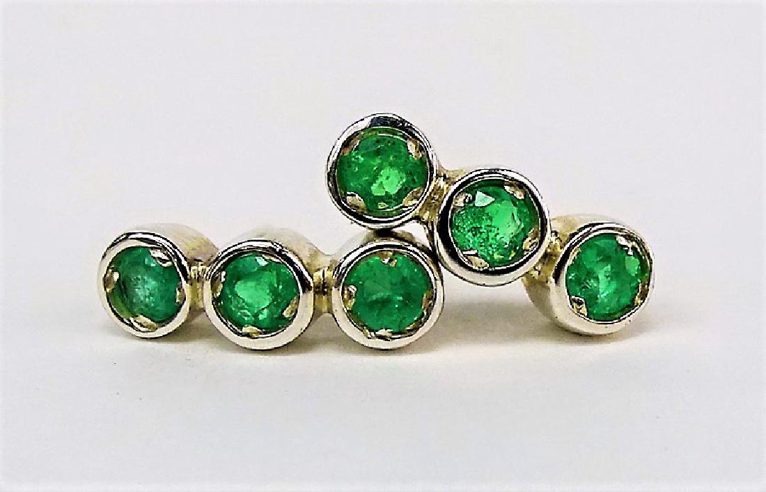 COLOMBIAN EMERALD 1 1/2CT LADIES EARRINGS: Brand new, each earring has 3 round lovely top quality emeralds, from Colombia. never worn, they had a retail price of $1149. mounted in 925 sterling, shipping to be $20 u.s. plus ins