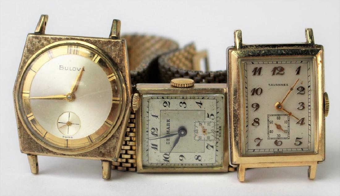 VINTAGE LOT OF COSTUME WATCHES: To include a Tavannes watch w/ out band, a Bulova watch w/ out band, and a Delmark watch. Shipping to be $15 US. We will combine with price.