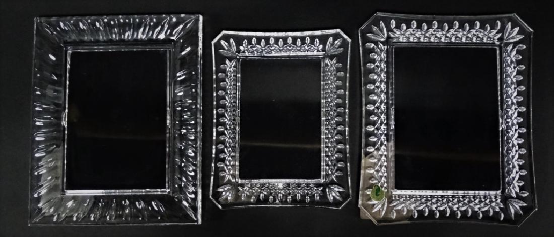 SET OF 3 WATERFORD CUT CRYSTAL PICTURE FRAMES: To include a set of three Waterford cut crystal picture frames. One measuring approx. 10.5" x 8.5", the second measuring approx. 10" x 8", and the third measuring approx. 8.5" x 6.5". Crafted from a h