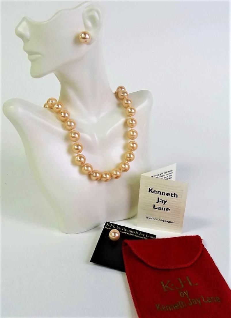 KJL BY KENNETH J. LANE PEARL SUITE: This lot includes a KJL by Kenneth J. Lane pearl suite (necklace & earrings). Includes original packaging. Shipping to be $15 US. We will combine with price.