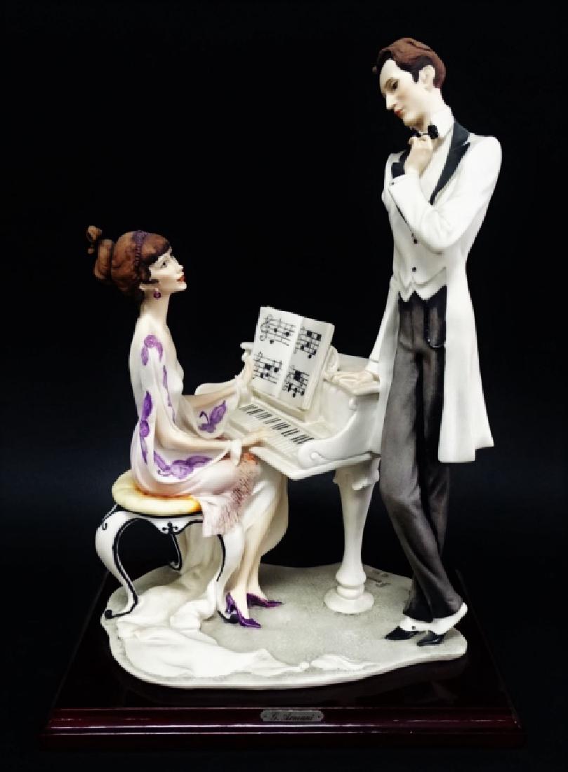 GIUSEPPE ARMANI TITLED "THE PIANO" FIGURINE: Large Giuseppe Armani titled "The Piano" #443-F figurine. Measures approximately 15" tall. We will not ship this item. We can refer local shippers.