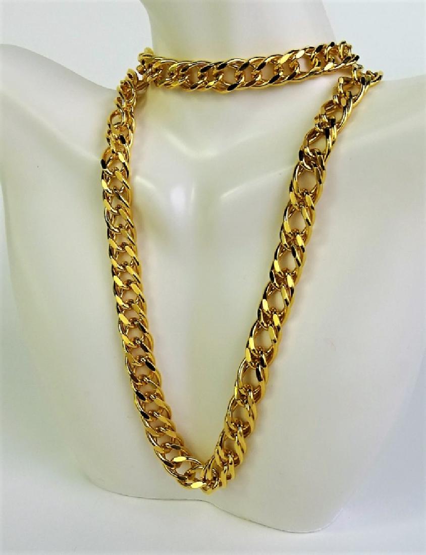 KJL BY KENNETH J. LANE CUBAN LINK NECKLACE: This lot includes a KJL by Kenneth J. Lane gold tone Cuban link necklace. Shipping to be $15 US .We will combine with price.