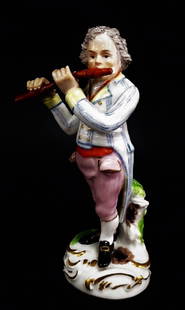 VIENNA PORCELAIN MANUFACTORY FLUTIST: This lot contains a Vienna Porcelain Manufactory flutist. Contains blue striped shield mark on bottom of porcelain. Measures approximately 7". We will not ship this item. We can refer local shipping.