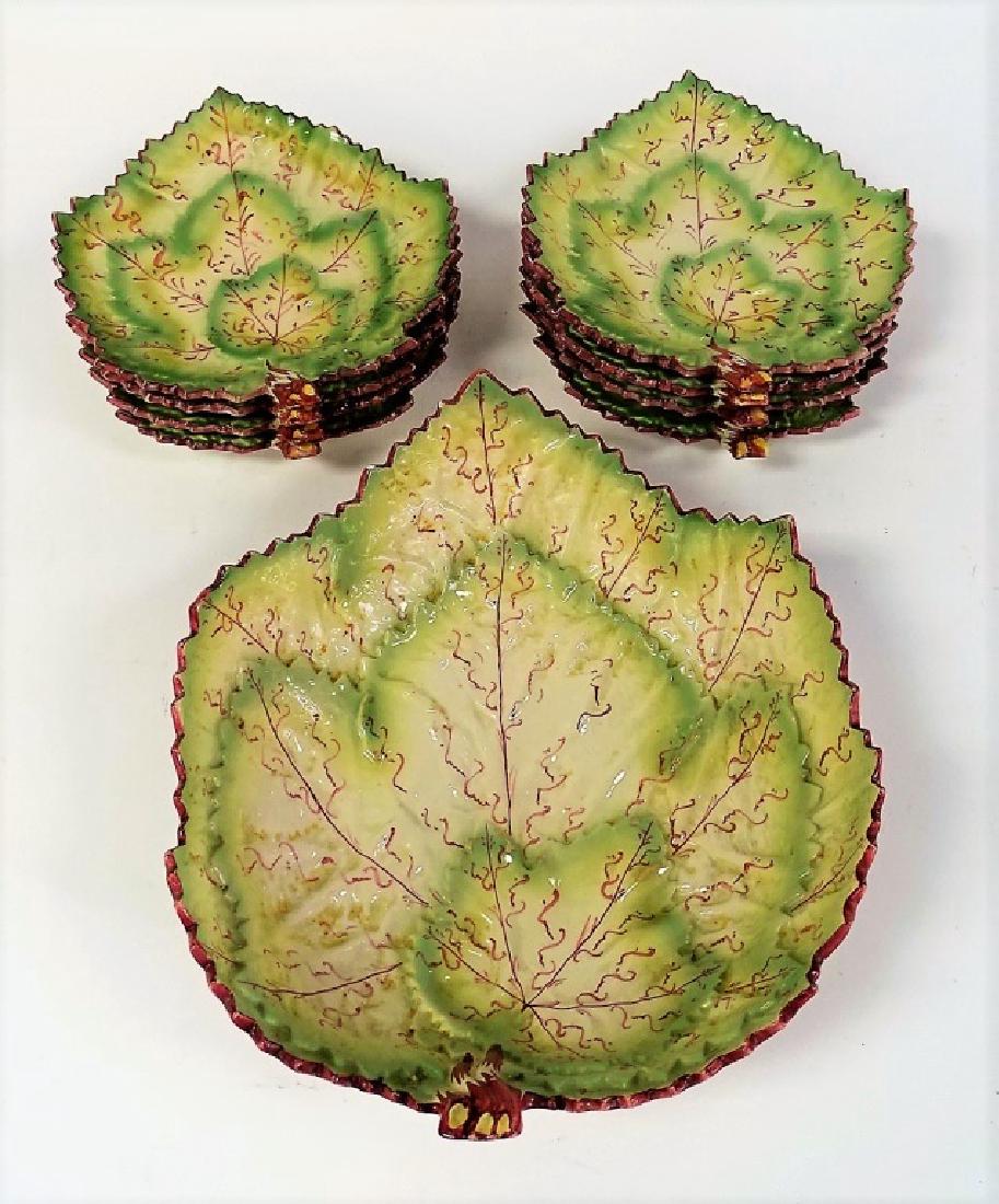 VINTAGE PORTUGUESE MAJOLICA SALAD SET: Large leaf shape majolica 13" salad bowl, with 8 smaller 10" plates. Set dates to the 1950's. In very good condition. We will not ship, can refer local shippers.