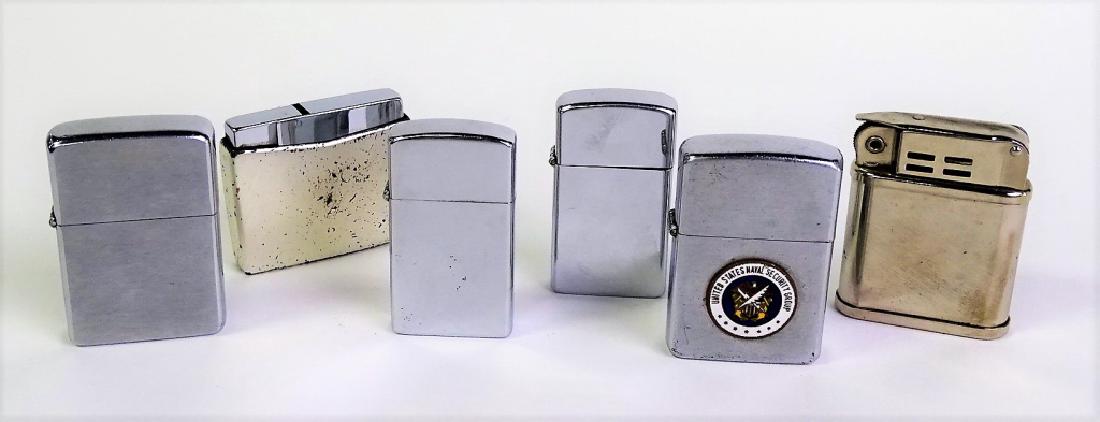 6 VINTAGE CIGARETTE LIGHTERS TO INCLUDE ZIPPO: We will not ship, can refer local shippers.