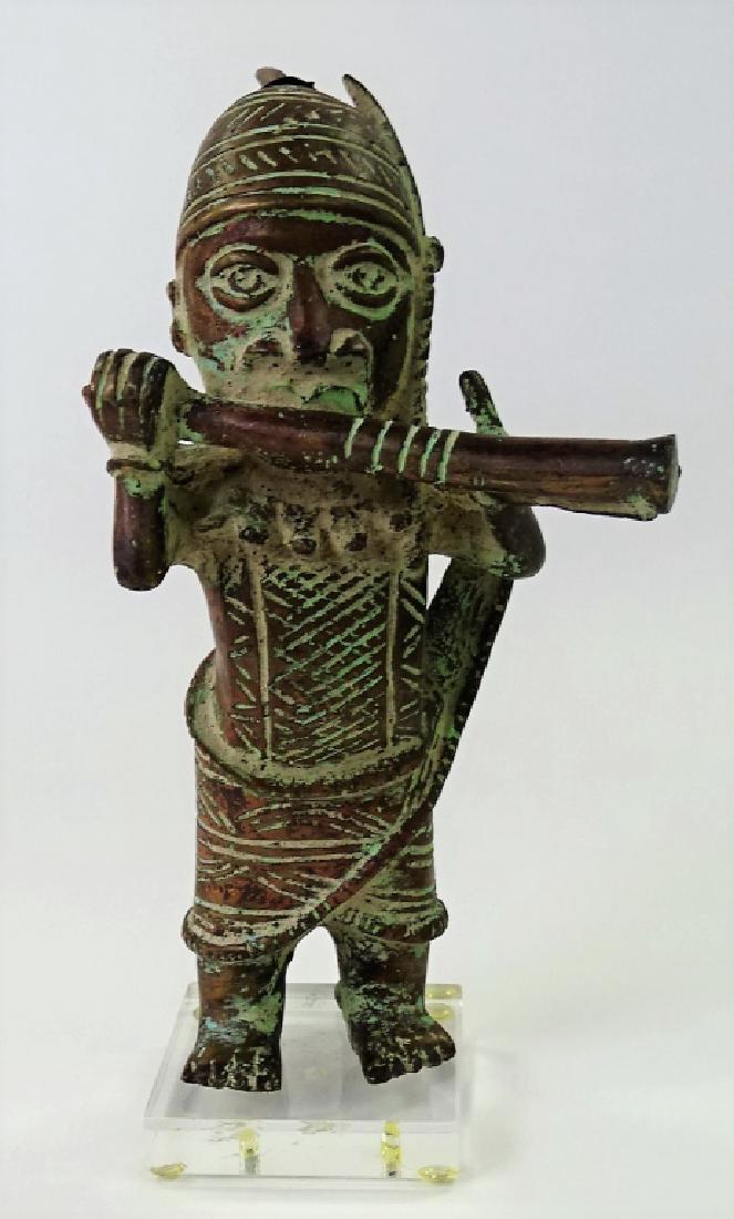 ANTIQUE AFRICAN BRONZE & LUCITE ALGAITA MUSICIAN: This lot consists of an antique African bronze and lucite algaita musician player. Provenance: Miami estate. Measures approx. 8-1/4" tall. We will not ship this lot. Local shippers recommended upon re
