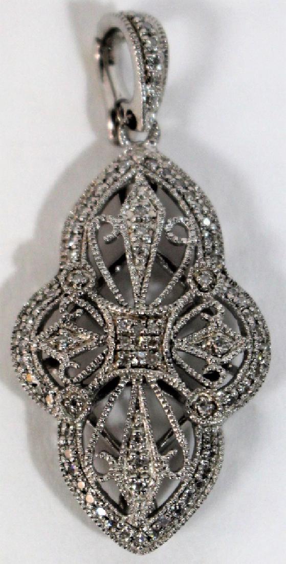 SIGNED LESLIE GREEN STERLING & DIAMOND ENHANCER: Measures about 1" long, total weight 4.2 grams shipping $15 plus ins