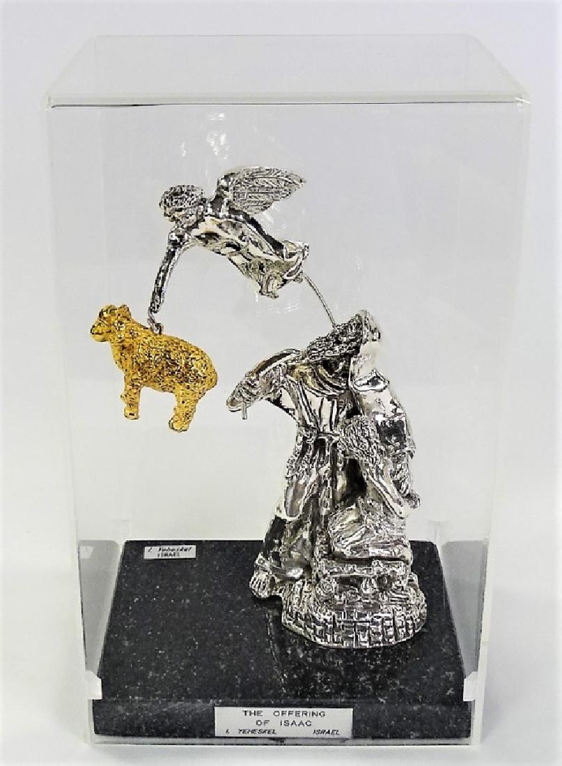 LARGE SILVER THE OFFERING OF ISSAC / YEHESKEL: Measures 8 1/2" tall. Signed 925. Artist Yeheskel. Comes in a plexiglass case. We will not ship, can refer local shippers.