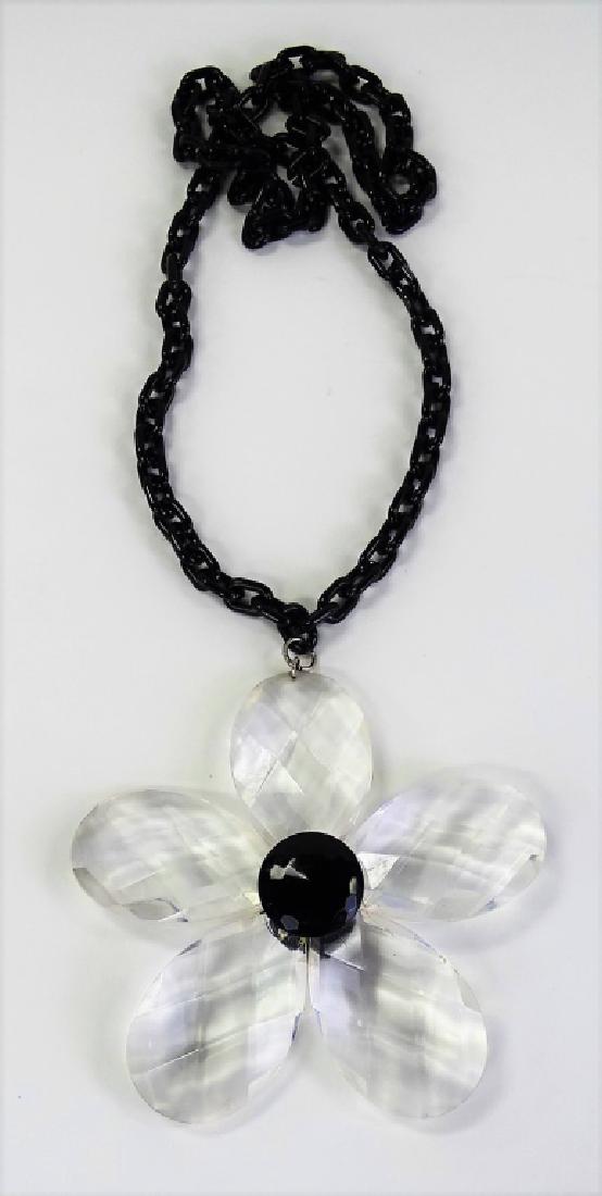 LARGE LUCITE DAISY NECKLACE AND CHAIN: Measures 32" long, flower measures 5" wide, in cery good condition shipping $20 plus ins u.s.