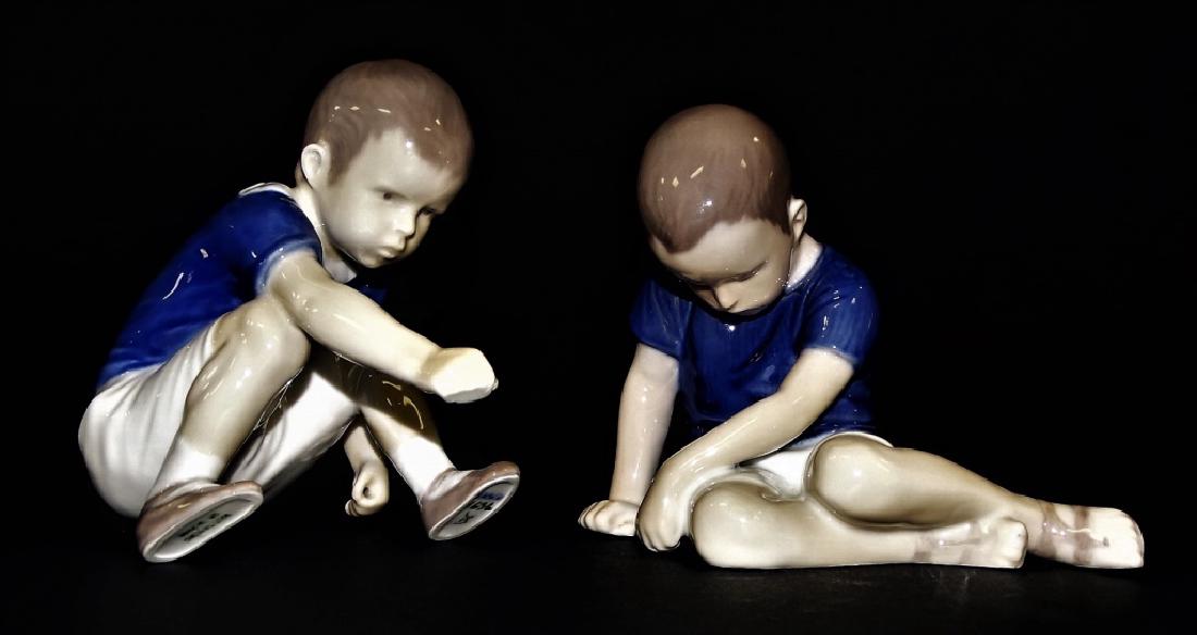 PAIR OF BING AND GRONDAHL KID FIGURINES: Pair of Bing and Grondahl porcelain figurines of children seated. Both measures approx 4" tall. Will not ship can refer local shippers.