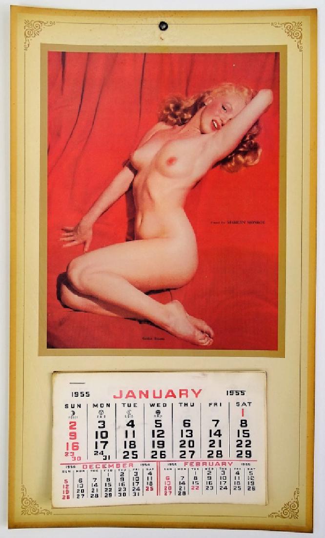 MARILYN MONROE 1955 PIN-UP CALENDAR: MARILYN MONROE 1955 PIN-UP CALENDAR Original 1955 Marilyn Monroe ""Golden Dreams"" nude pin-up calendar. Measures approx 17 " tall x 10 " wide. Featuring Monroe in her famous nude pose at center. Will