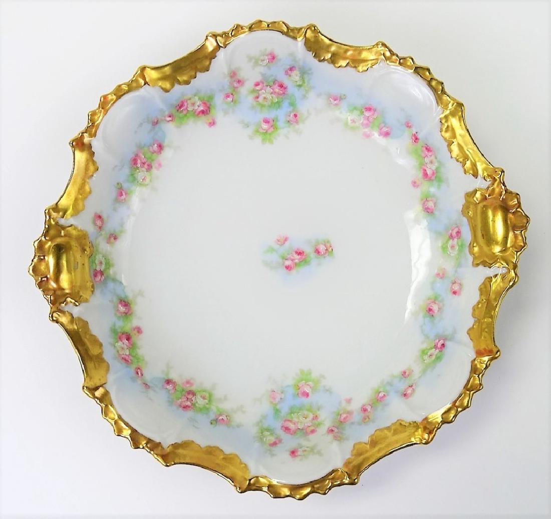 ANTIQUE LIMOGES HAND PAINTED FLORAL BOWL: Coronet painted. Coiffe mark made. Measures 9" in diameter. In very good condition. We will not ship, can refer local shippers.