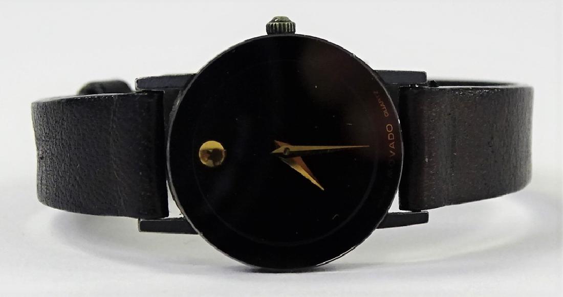 MOVADO SWISS MADE STAINLESS STEEL WATCH: Ladies' Movado Swiss made Stainless Steel watch. With quartz movement and mystery dial, held on adjustable black Leather band. Shipping to be $20 + insurance in US.