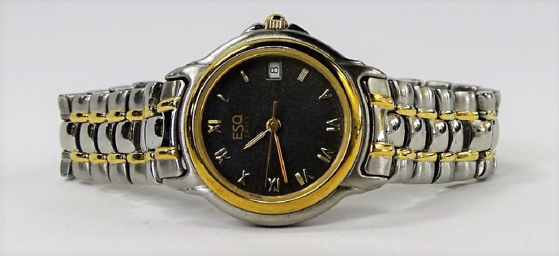 LADIES ESQUIRE SWISS MADE STAINLESS STEEL WATCH: Ladies' Esquire Swiss made Stainless Steel watch. With two tone design, quartz movement, and Roman numerals. Will fit an extra large size wrist, opening measures approx. 2-12/16" in diameter.