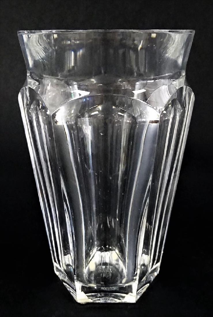 BACCARAT CUT CLEAR CRYSTAL VASE: Baccarat France facet cut Crystal vase, in tapered shape. Etched "Baccarat" signature to base edge. Measures approx. 6-3/4" H. Referred shippers available upon request.