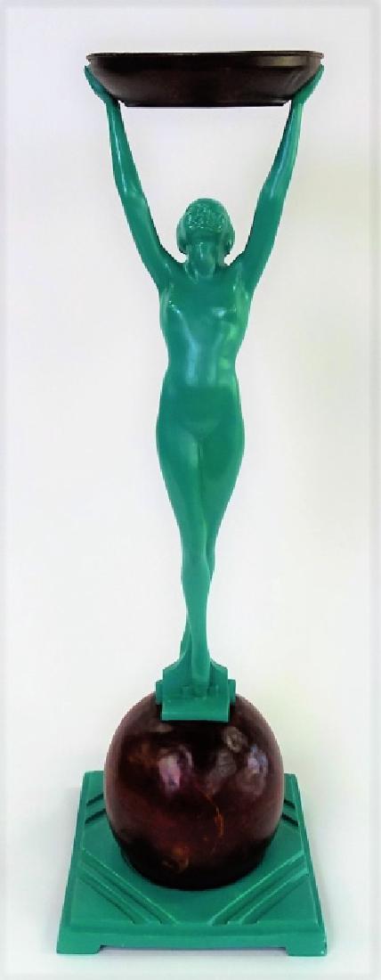 FRANKART FIGURAL NUDE SMOKING STAND: Original Frankart Inc. Art Deco figural smoking stand, No. T330. In the form of a nude with arms raised above her head in support of the round dish. Raised atop a bronze colored orb on a square metal