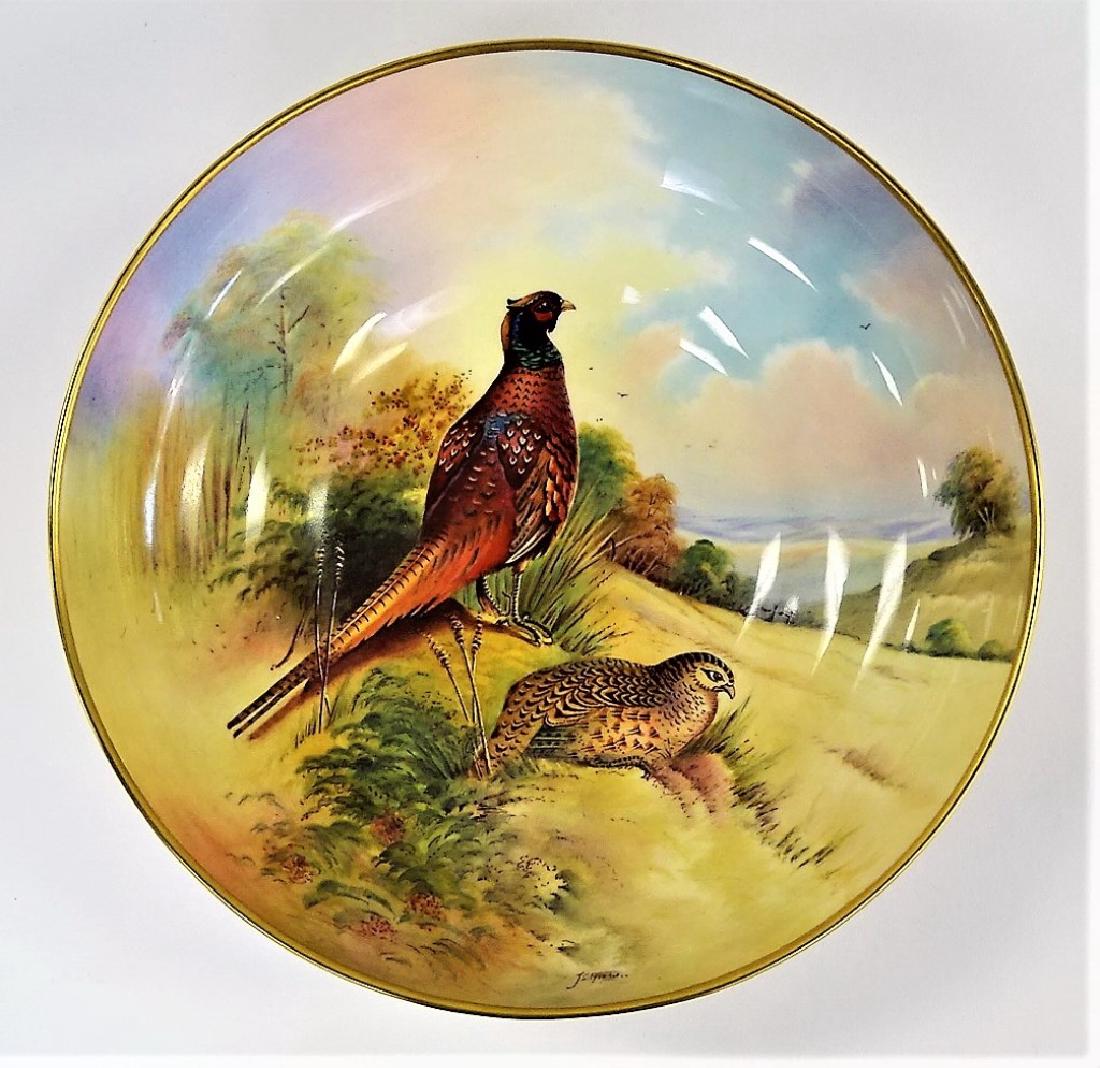 ANTIQUE H/P AYNSLEY PORCELAIN GAME BOWL: Early 20th century English bone china porcelain footed bowl. Decorated with hand-painted game bird scene by artist J. Shaw. Has gilt accented rim, base, and bowl tondo. Holds green Aynsley mark and ar