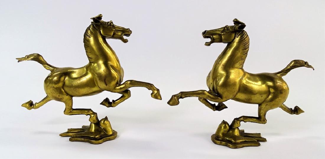 PR GILT BRONZE FLYING HORSE OF KANSU SCULPTURES: Pair of 20th century Chinese gilt bronze sculptures, in depiction of the Gansu Flying Horse, a phenomenal Eastern Han dynasty bronze sculpture discovered in 1969 near the city of Wuwei in the province