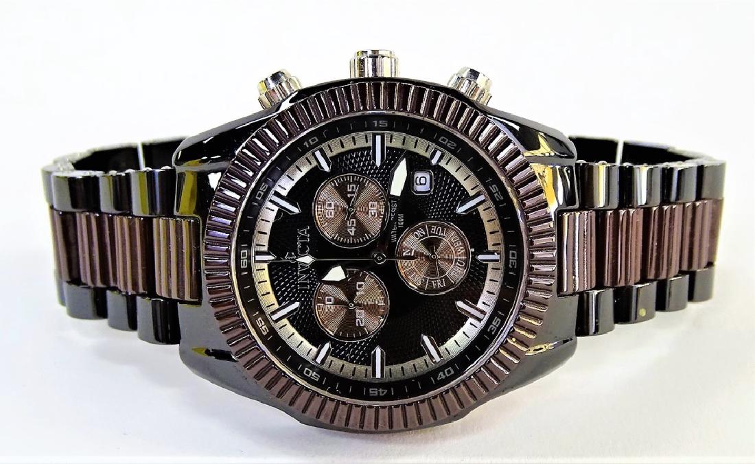 LARGE MEN'S INVICTA BLACK FACE WATCH WITH BOX: In good running order. Shipping U.S. to be $15 plus insurance. Will combine shipping.