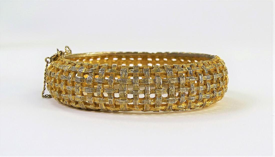HATTIE CARNEGIE GOLD TONE WOVEN BRACELET: Very rare mid century bangle. In excellent condition. Shipping to be $15 plus insurance. We will combine shipping.