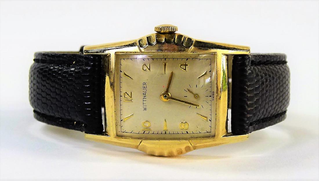 WITTNAUER GOLD FILLED LEATHER BAND WATCH: Total weight 28.4 grams. Shipping to be $20 plus insurance. Third Party Shipping Required. Local Recommendations are available upon request.