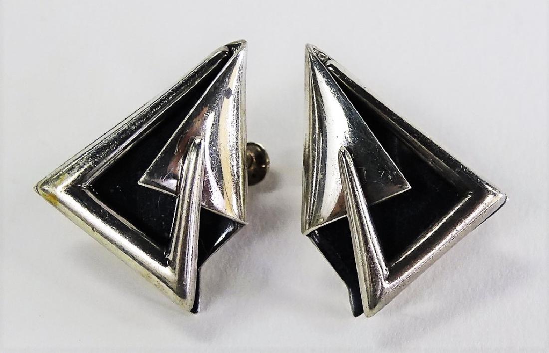 PR SIGI TAXCO MEXICO GEOMETRIC STERLING EARRINGS: Pair of Sigi Taxco Mexican sterling silver earrings in unique geometric form. With lever-back/screw backs. Combined total weight is approx. 0.42 ozt (13.1 grams). Shipping to be $20 + insurance in US.