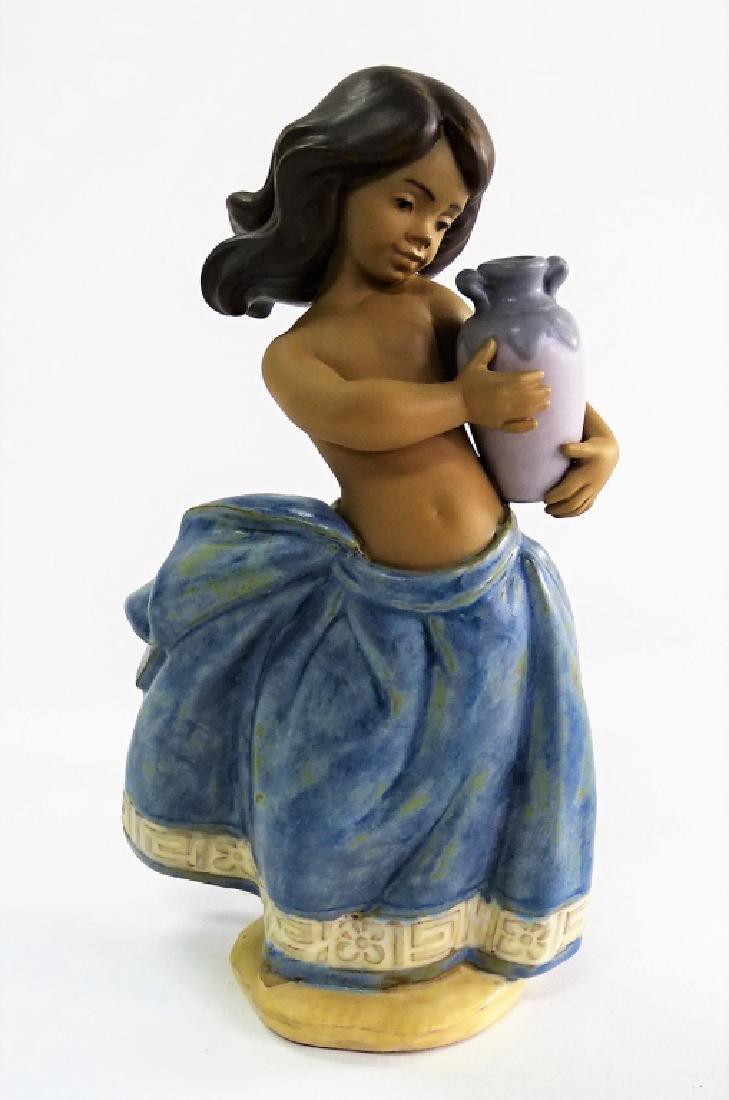 LLADRO PORC. 'LITTLE PEASANT GIRL' FIGURINE #2331: Lladro Spanish porcelain 'Little Peasant' figurine in blue #2331. Issued in 1996, sculpted by José Puche. With gres finish. Measures approx. 7-1/4"H. Referred shippers available upon request.