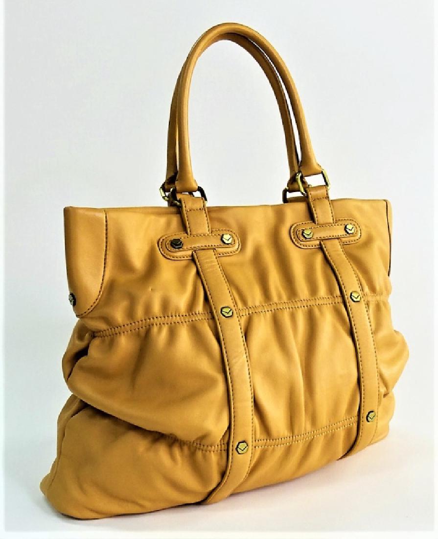 VIA SPIGA LAMB SKIN LADIES LARGE TOTE: Measures 15" wide. In good condition. We will not ship can refer local shippers.