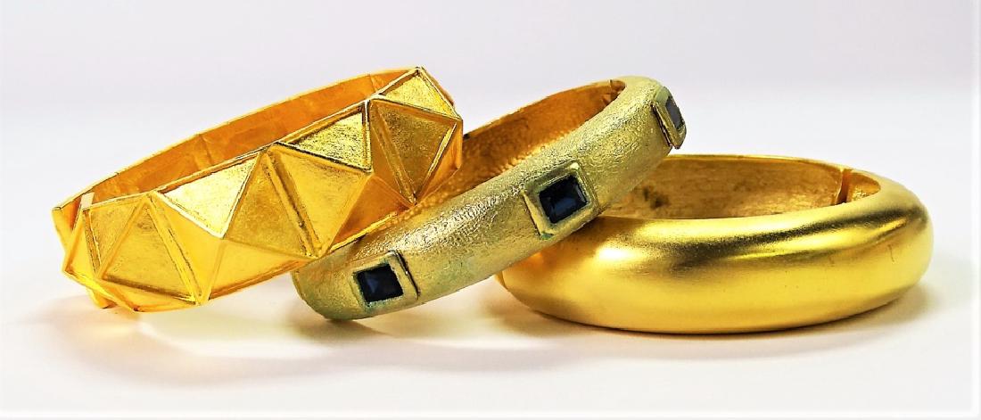 LOT OF SATIN GOLD FINISHE TONE BRACELETS 2 K.J.L.: Two of the bracelets are signed Kenneth J. Lane. All in great condition. Shipping $15 plus insurance.