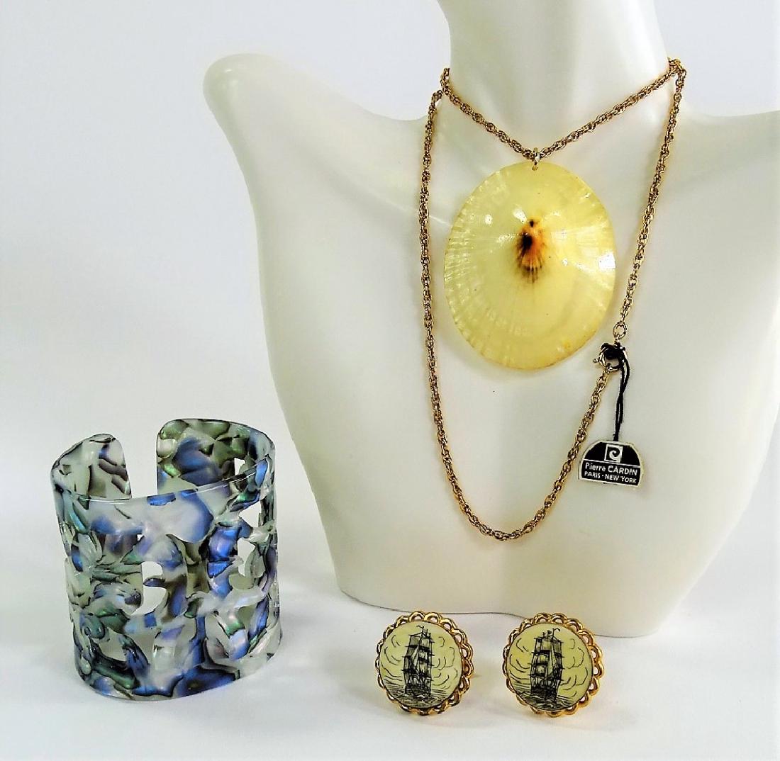 COSTUME LOT TO INCLUDE SCRIMSHAW CUFFLINKS: Bakelite cuff, Pierre Cardin. Shipping $15 plus insurance.