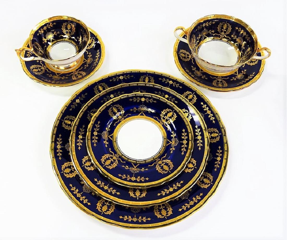 AYNSLEY GILT EMBOSSED COBALT PORC. DINNERWARE SET: One-hundred and twenty-three piece collection of Aynsley English fine bone china dinnerware, in embossed gilt pattern over cobalt ground, to include; Eighteen 10-1/2" dinner plates, eighteen 8-1/4" lu