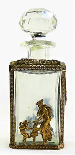 VTG FRENCH CRYSTAL & BRASS OVERLAY SCENT BOTTLE: Vintage French crystal scent bottle, in large size and square form, with rounded facet cut stopper. Overlayed with brass mount with ivy leaf banding, side panels with winged torches and wreaths, and