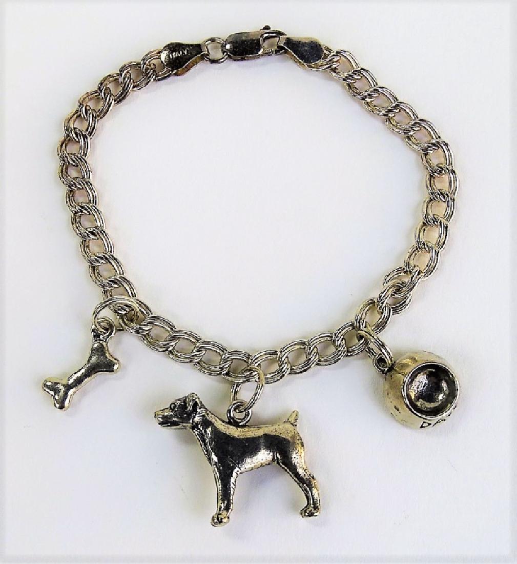 BARRY KISELSTEIN-CORD STYLE CHARM BRACELET: Vintage Italian crafted sterling silver charm bracelet, in the style of Barry Kiselstein-Cord designers. Adorned with a dog, bone, and dog's bowl charms suspended from a double link chain. With lobste