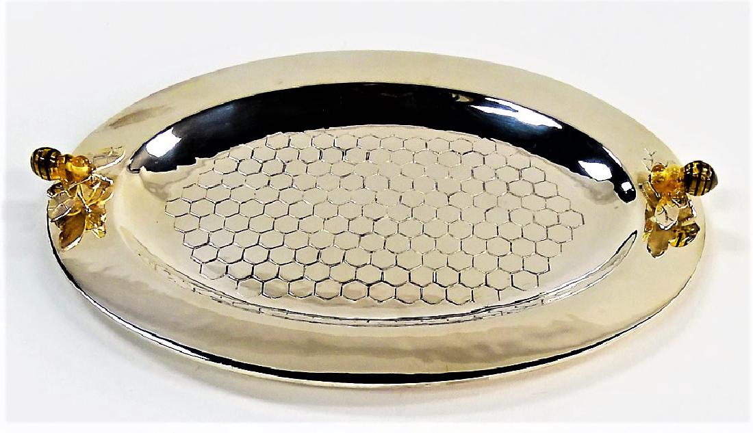 LOS CASTILLO SILVER PLATED HONEYCOMB TRAY: From the paramount craftsmen of Los Castillo - Mexico, this tray is in oval form, featuring a beautiful honeycomb design and applied Bee ornaments on the rim. Hallmarked to bottom. Measures approx. 10