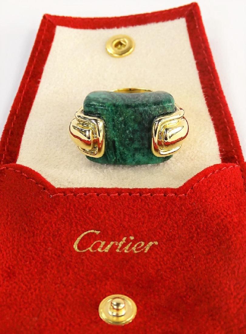 A. CIPULLO CARTIER 18K YELLOW GOLD & MALACHITE RING: Vintage Cartier 18 karat yellow gold & chunky Malachite ladies ring. Designed by one of Cartier's most prominent designers Aldo Cipullo. Polished & certified by Cartier of Boca Raton. Serial: 39009. M