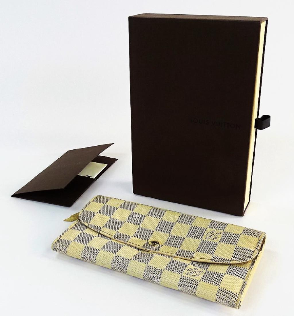 LOUIS VUITTON WALLET EMILIE DAMIER AZUR w/ BOX: Measures 7-1/2" Wide x 4" Tall. Comes with original Louis Vuitton box & receipt. From a Boca Raton estate. Originally purchased at Louis Vuitton Boca Raton in 2013. Condition: Pre-owned/Overall Good C