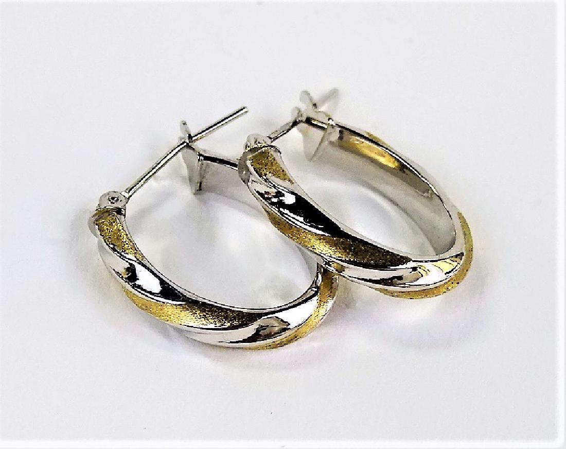 PR LADIES 14KT WHITE GOLD HOOP EARRINGS: Pair of retro ladies' 14 karat white gold hoop earrings, with yellow gold toned satin finish embellishments. Combined total weight is approx. 0.8 dwt (1.2 grams). Shipping to be $20 + insurance in US.