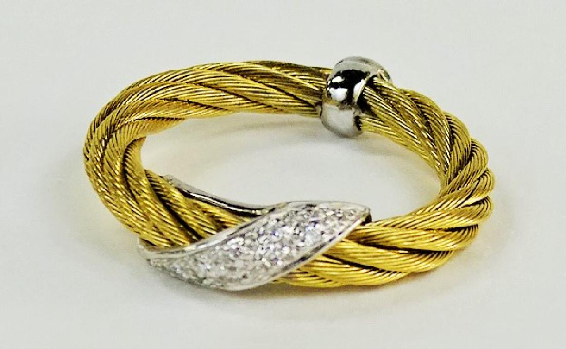 CHARRIOL 18KT Y GOLD & DIAMOND LADIES BAND: Size 6, with about .15cts of round brilliant diamonds , from a local estate total weight 3.4 grams shipping U.S. is $20 plus ins