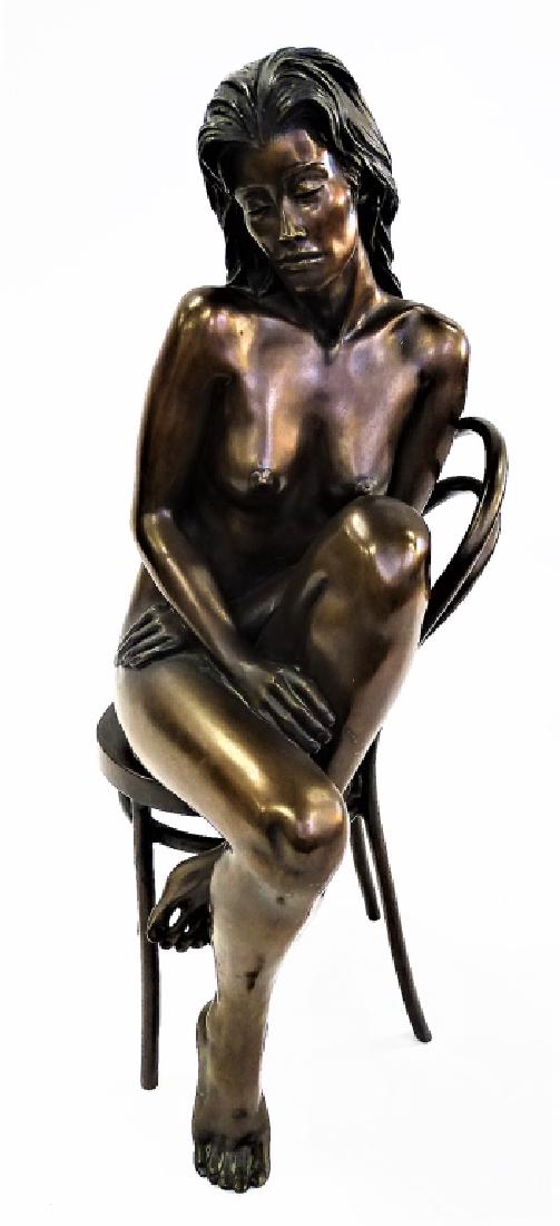 BILL MACK BRONZE SCULPTURE OF SEATED NUDE: Bill Mack (American, b. 1968); Original patinated bronze sculpture modeled in the form of a nude female in seated position atop a chair. Has incised artist signature and numbered edition of 141/150 to