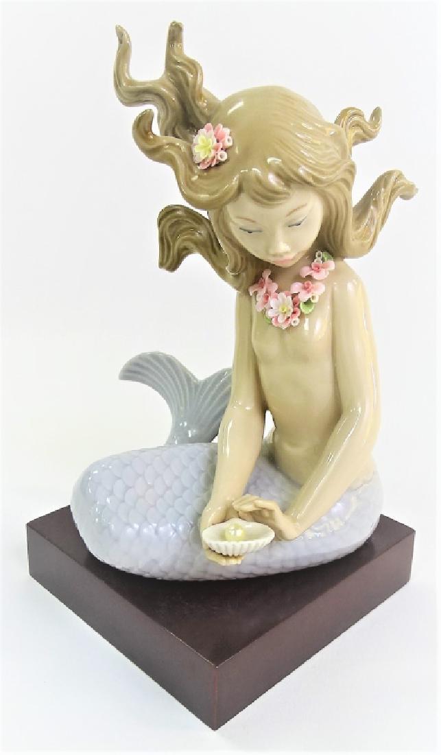LLADRO SPANISH PORCELAIN "MIRAGE" FIGURE #1415: Lladro Spanish porcelain "Mirage" figure #1415. Issued in 1982. Sculpted by Jose Puche. Has a glazed finish. Stands approx. 7"H. Third party shipping required. Local recommendations available.