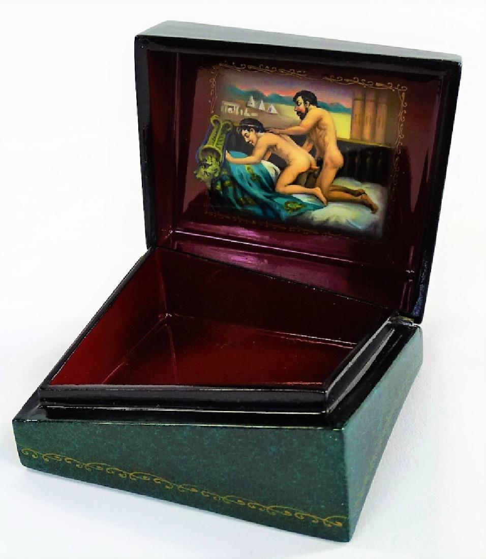 HAND PAINTED EROTIC RUSSIAN LACQUER BOX: Fine Russian lacquer casket box, in convex square shape, hand-painted with highly detailed courting scene to the cover and a homo-erotic scene to the cover reverse. Artist signed in Cyrillic. Measures