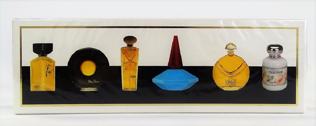 PARFUMS PARIS 6 BOTTLE BOX SET: Parfums Paris six bottle box set to include; a bottle of Paloma Picasso eau de parfum, a bottle of Guy Laroche "Clandestine" eau de toilette, a bottle of Lancome "Magie Noire" eau de toilette, plus mo